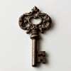 oldfashioned key with a white background